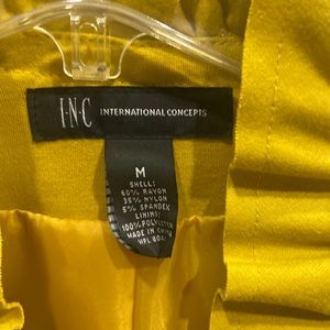 Cutest yellow blazer with zipper.